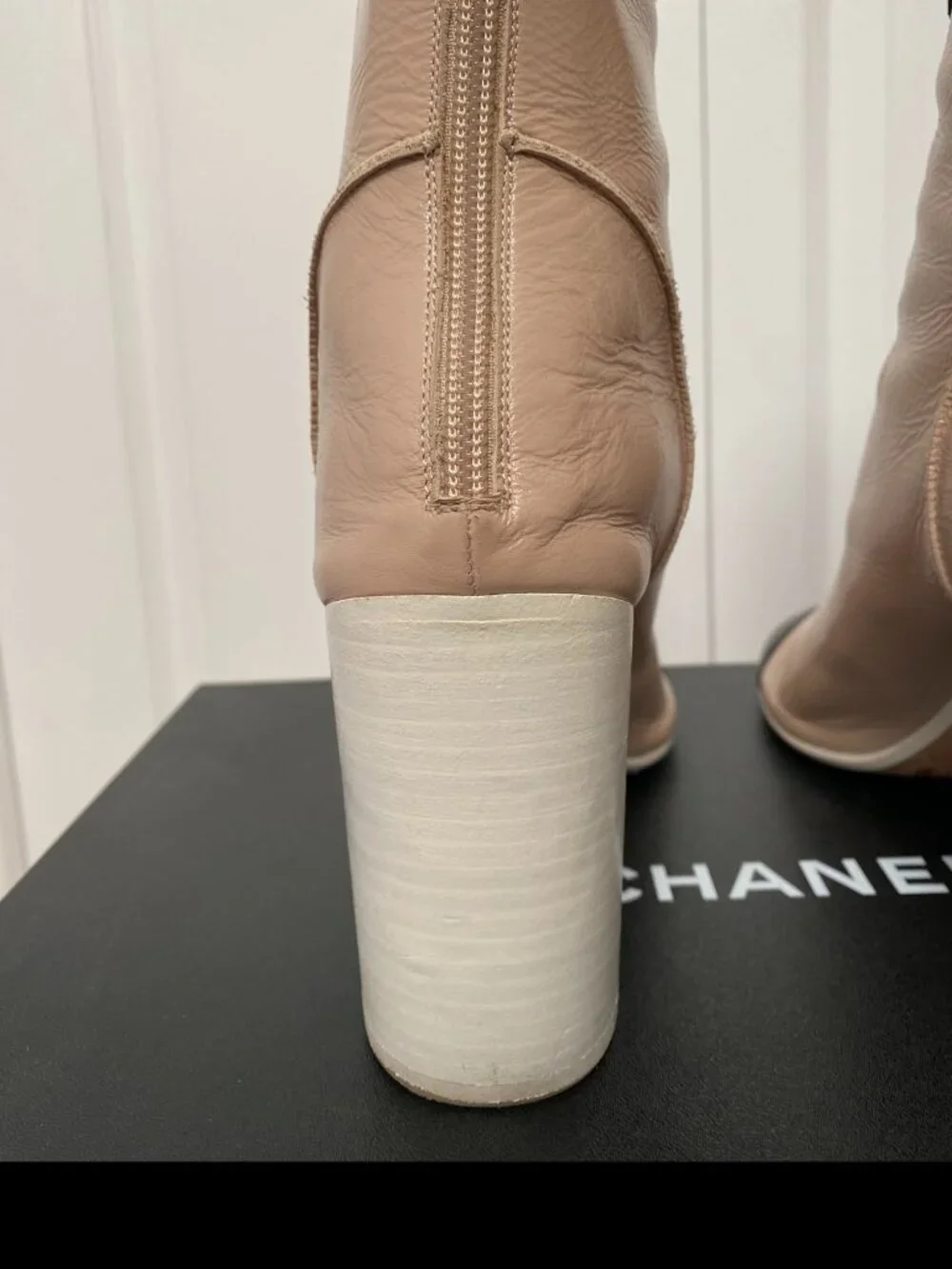 CHANEL Two-Toned Leather Cap-Toe Block Heel Ankle Boots in Beige & Black